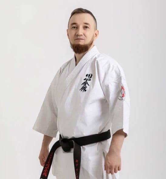 Санжар Кине